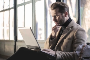 Man thinking while on computer